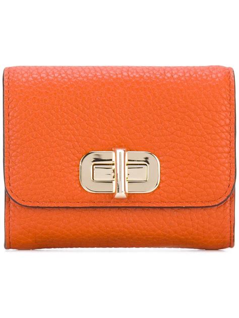 orange purse michael kors|michael kors orange wallet.